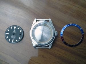 My chinese parts. * Tiger Concept vintage Tudor-style diving dial with date. * Tiger Concept vintage stainless steel diver case. * Aftermarket vintage GMT "Pepsi" besel insert.