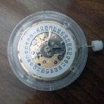 HANGZHOU 6460 movement with Rolex-style date wheel.